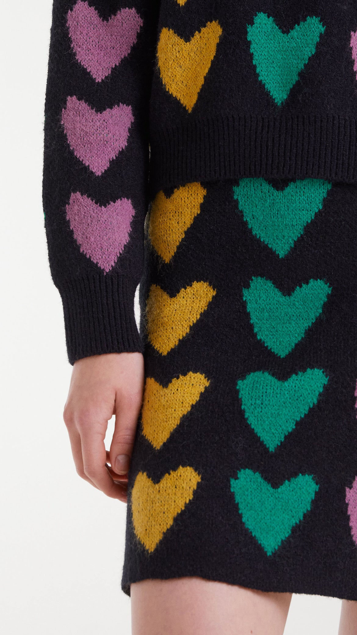 Falda corta de punto jacquard con estampado cupido lines