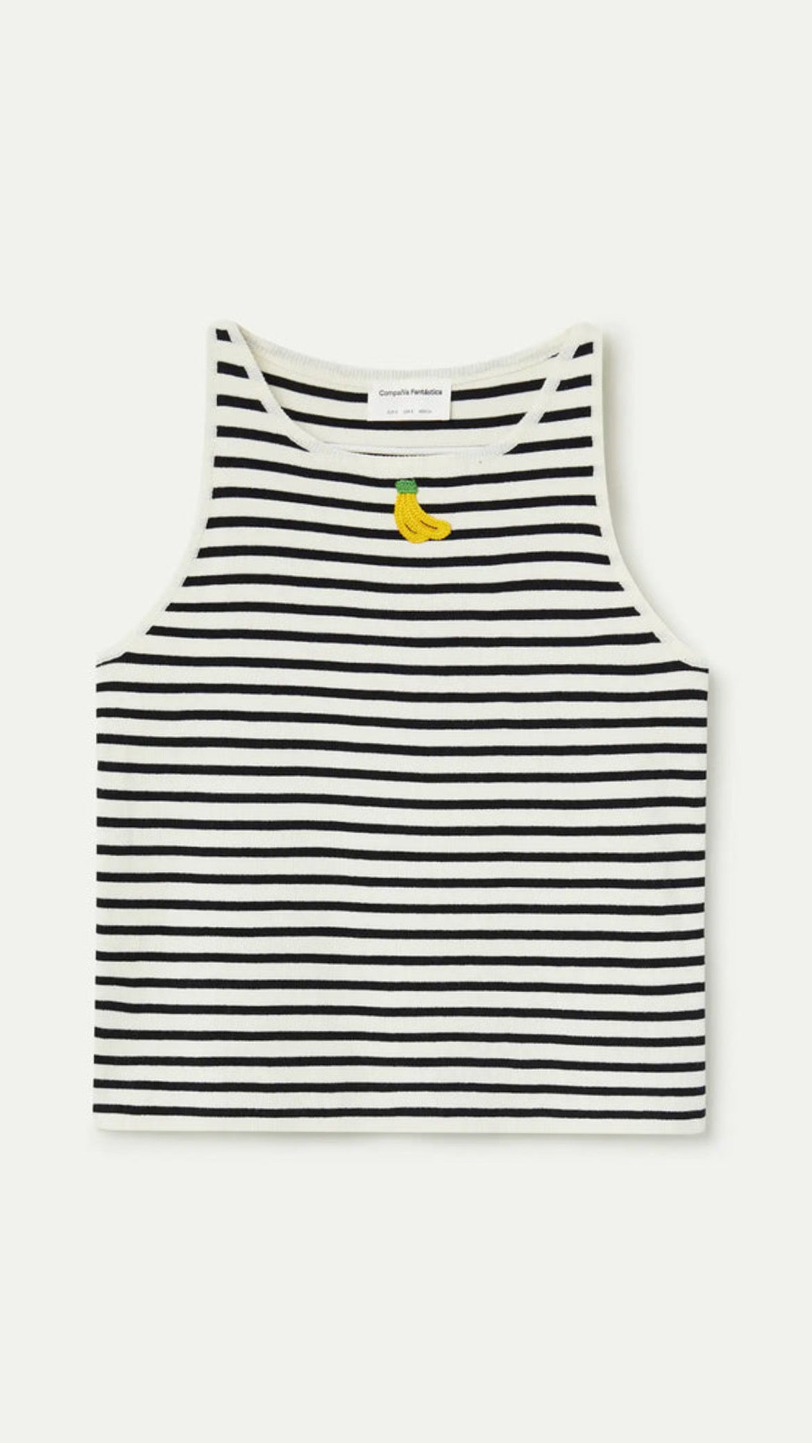 Top de rayas blanco y negro con bordados de banana