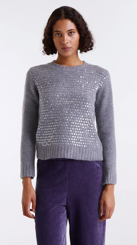 Jersey de punto gris con detalles en lentejuelas