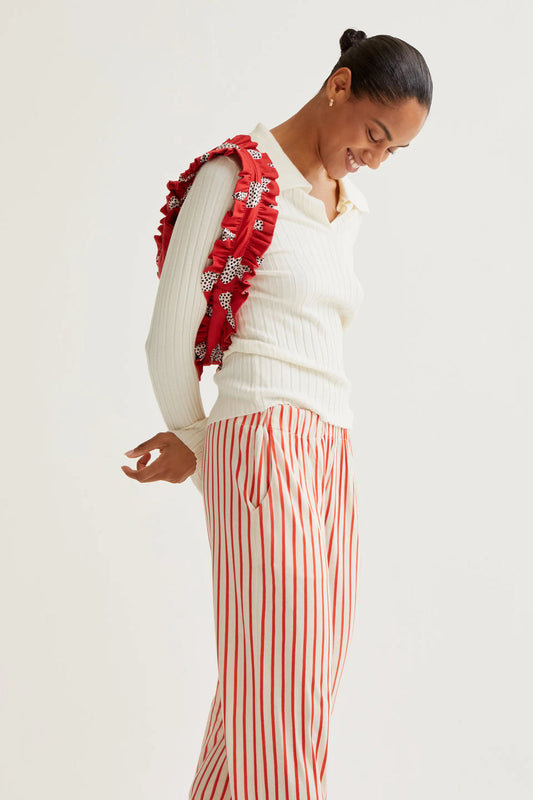 Pantalón con estampado rayas rojas