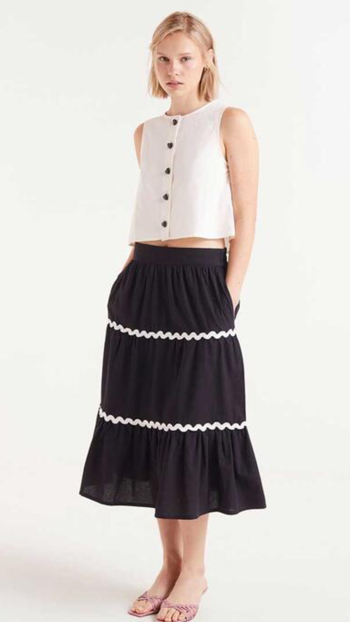 Top sin mangas con botones blanco