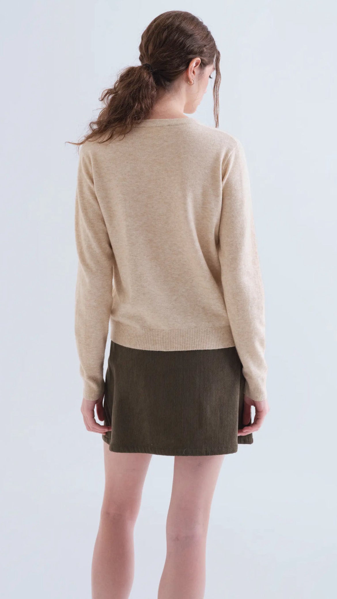 Jersey punto beige con detalle de uva